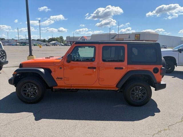 2026 Jeep Wrangler — rear three-quarter view