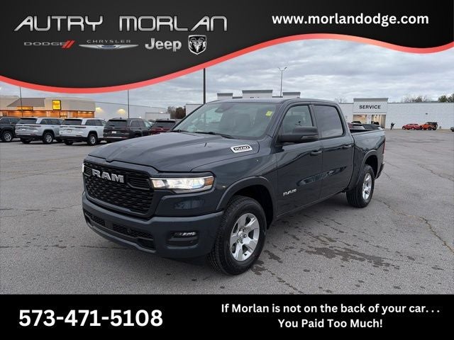 2026 RAM Ram 1500 RAM 1500 BIG HORN CREW CAB 4X4 5'7' BOX in Forged Blue Metallic Exterior Paint — front three-quarter view