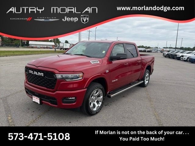 2026 RAM Ram 1500 RAM 1500 BIG HORN CREW CAB 4X4 5'7' BOX in Molten Red Pearl-Coat Exterior Paint — front three-quarter view