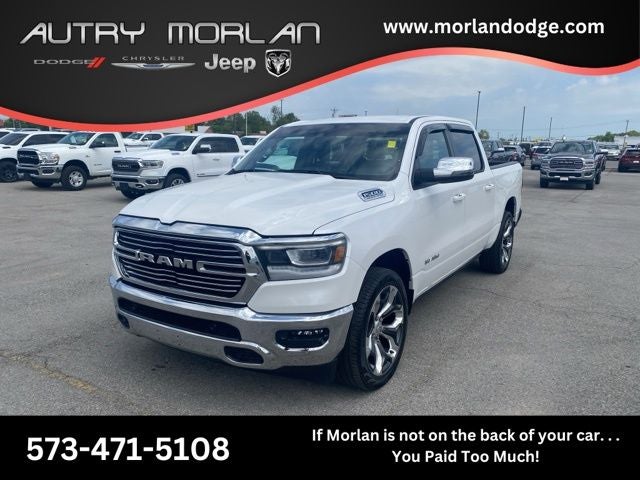 2023 RAM 1500 Laramie Crew Cab 4x4 5'7' Box in Ivory White Tri-Coat Pearlcoat — front three-quarter view