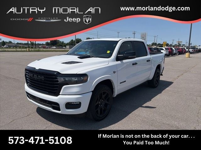 2026 RAM Ram 1500 RAM 1500 LARAMIE CREW CAB 4X4 5'7' BOX in Bright White Clear-Coat Exterior Paint — front three-quarter view