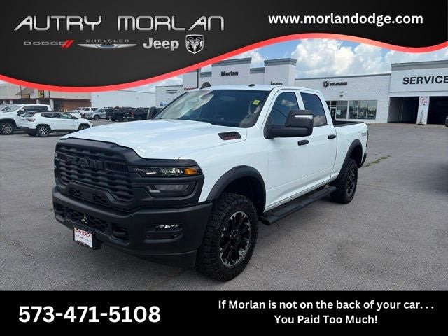 2026 RAM Ram 2500 RAM 2500 WARLOCK CREW CAB 4X4 6'4' BOX in Bright White Clear-Coat Exterior Paint — front three-quarter view